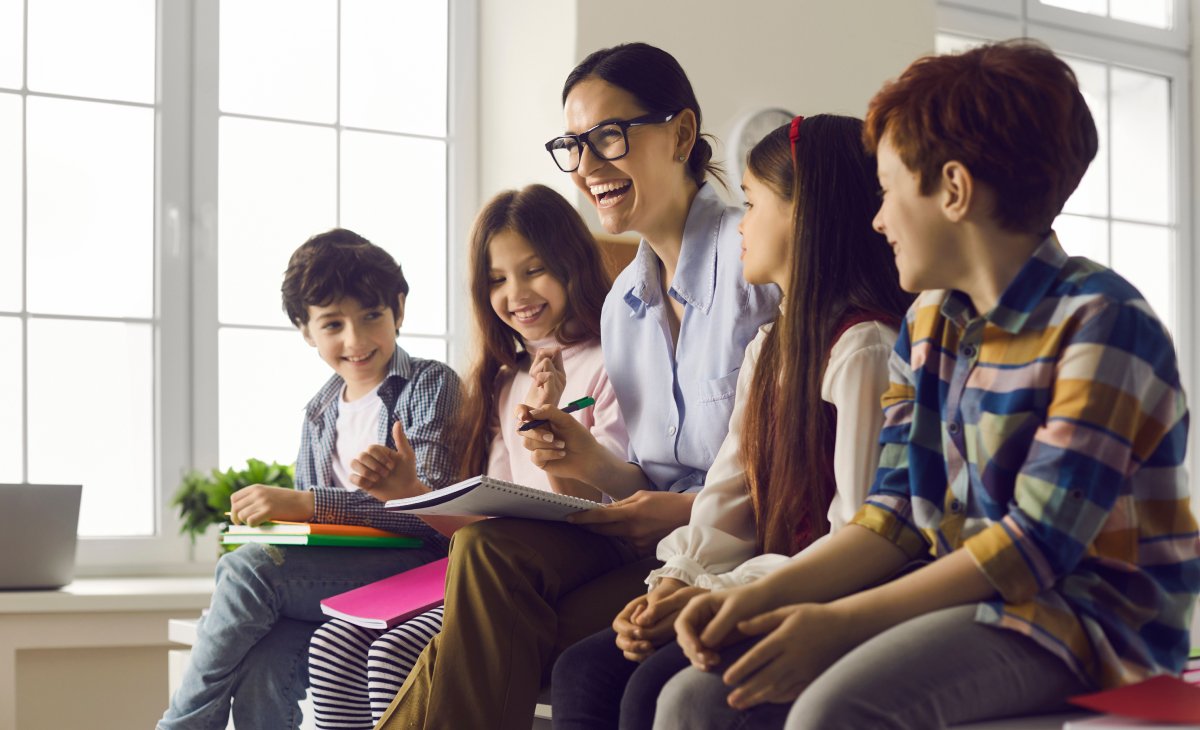 Young classroom teacher and students
